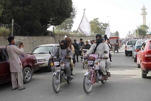 In this June 16, 2018 file photo, Taliban fighters ride their motorbikes inside Ghazni city, capital of Ghazni province, west of Kabul, Afghanistan. (Photo | AP)