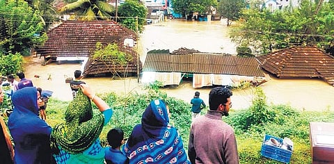 A residential area inundated by the recent flash floods in Palakkad | melton antony