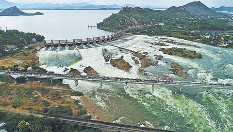 Aerial view of Mettur dam after water is discharged from 16 Ellis surplus sluices on Sunday | special arrangement