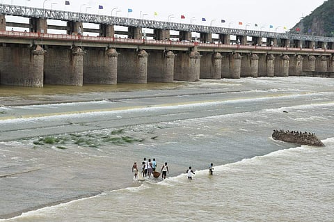 Flood water released from the Prakasam Barrage in Vijayawada. ( Photo | RVK Rao/ EPS)