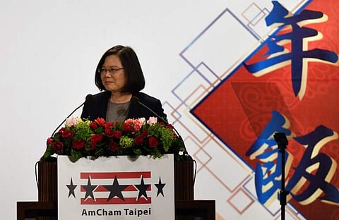 Taiwanese President Tsai Ing-wen speaks during a banquet held by the American Chamber of Commerce in Taipei on March 21, 2018. Taiwan said it had scrambled jets and sent ships to track a Chinese aircraft carrier which passed through the Taiwan Strait as B