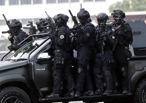 In this July 25, 2018, photo, members of joint Indonesian police and military special forces take part in an anti-terrorism drill ahead of the 2018 Asian Games in Jakarta, Indonesia. (Photo | AP)