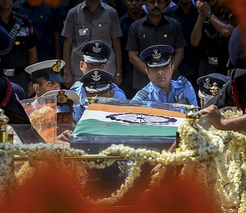 Mortal remains of former prime minister Atal Bihari Vajpayee drapped in a Tri-colour being taken from his Krishna Menon Marg residence to BJP headquarters at Deen Dayal Upadhyay Marg for the last rites in New Delhi on Friday August 17 2018. | PTI