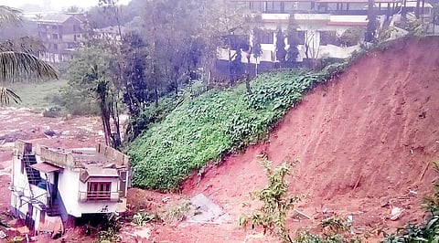 A building is brought down by a landslide in Madikeri on Thursday I KPN