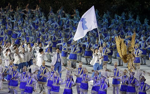 The combined Koreas march into Gelora Bung Karno Stadium under the 'unification' flag during the opening ceremony for the 18th Asian Games in Jakarta, Indonesia. (Photo | AP)