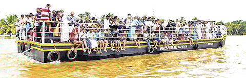 Rescued people being shifted to upper lands from Kuttanad on a jhankar arranged by the district administration on Friday | EXPRESS