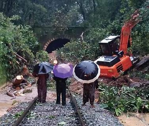 Railway personnel and contract workers clearing tracks in the Subrahmanya Road-Sakleshpur Ghat stretch