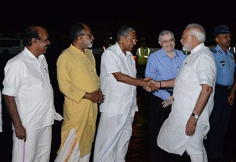 Chief Minister Pinarayi Vijayan receiving Prime Minister Narendra Modi at Thiruvananthapuram on Friday night. (Photo | EPS/BP Deepu)