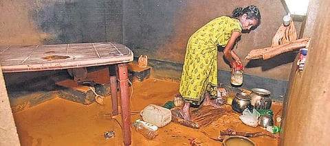 Balaki returns to her kitchen in Kulkunda ST colony after flooding to find it full of muck I Rajesh shetty Ballalbagh