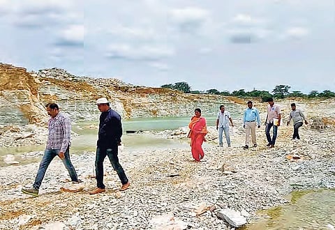SIT officials inspecting limestone quarries in Piduguralla and Dachepalli mandals of Guntur district on Saturday| Express