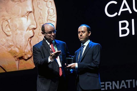 Kurdish mathematician, Caucher Birkar (R), 40, receives the Fields Medal Award, math's most prestigious prize, during the International Congress of Mathematicians (ICM 2018) in Rio de Janeiro, Brazil, on August 01, 2018. | AFP