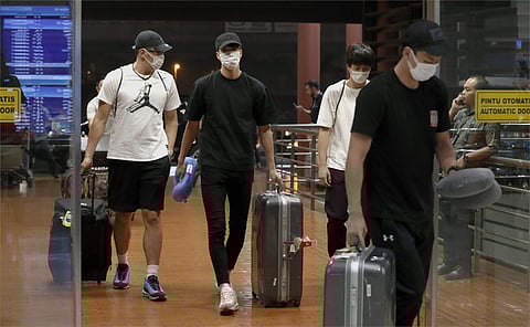 Banned Japanese basketball players arrive at Jakarta airport | AP