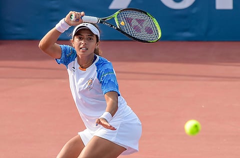 Indian tennis player Ankita Raina plays against Pakistan's Sarah M Khan and Mehaq Khokhar in the women's doubles match at the 18th Asian Games at Palembang in Indonesia on Monday Aug 20 2018. | PTI