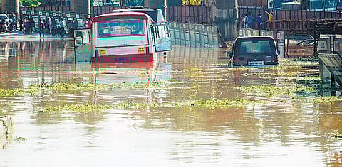 Heavy rainfall expected in September; city not yet prepared to deal with excess downpour despite past experience; drain encroachments remain. | Express Photo Services