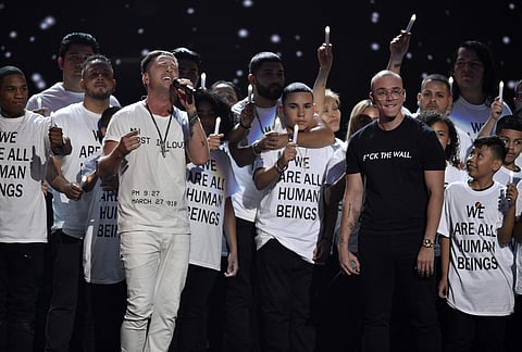 Ryan Tedder of One Republic, left, and Logic perform 'One Day' at the MTV Video Music Awards at Radio City Music Hall. | AP