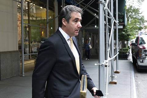 Michael Cohen, former personal lawyer to President Donald Trump, leaves his apartment building, in New York. (Photo | AP)