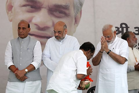 Prime Minister Narendra Modi and BJP president Amit Shah during the distribution of Asthi Kalash of late Former PM Atal Bihari Vajpayee to all the party state chiefs in New Delhi on Wednesday. | (Shekhar Yadav | EPS)