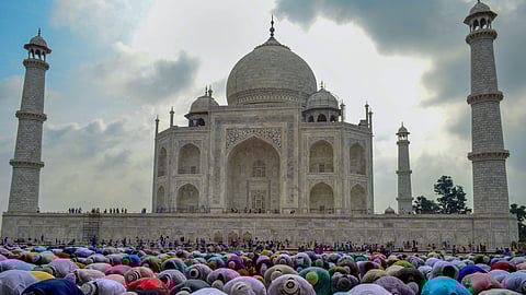 Muslims offering prayers at the Taj Mahal, Agra on the occasion of Bakrid.