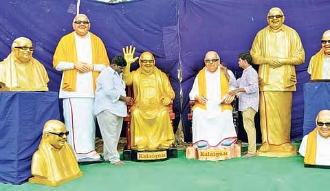 Tenali sculptor Katuri Venkateswara Rao and his son Ravindra with the statues of late Karunanidhi in Guntur on Tuesday | EXPRESS