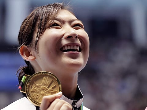 Japan's golden girl Rikako Ikee during a medal ceremony at Jakarta | AP