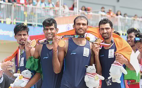 Gold medallists Indian rowing Men's team members Sawarn Singh Bhokanal Dattu Om Prakash and S Singh pose for photo after the presentation ceremony for the Men's Quadruple Sculls event at the 18th Asian Games Jakarta Palembang 2018 in Indonesia. (Photo | P