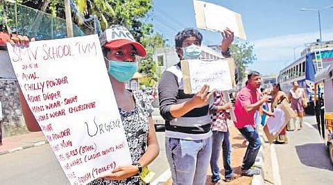 (File pic) Volunteers seeking help from public to arrange relief materials, in front of SMV School at Overbridge Junction B P Deepu