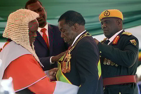 Zimbabwean President Emmerson Mnangagwa during his inauguration ceremony at the National Sports Stadium in Harare, Sunday, Aug. 26, 2018. The Constitutional Court upheld Mnangagwa's narrow election win Friday, saying the opposition did not provide ' suffi