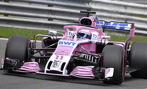 Force India driver Sergio Perez of Mexico steers his car during a qualifying session ahead of the Belgian Formula One Grand Prix in Spa-Francorchamps, Belgium. | AP