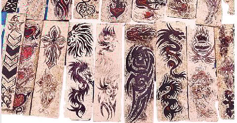 Temporary tattoos range from stars,flowers to pictures of Budha