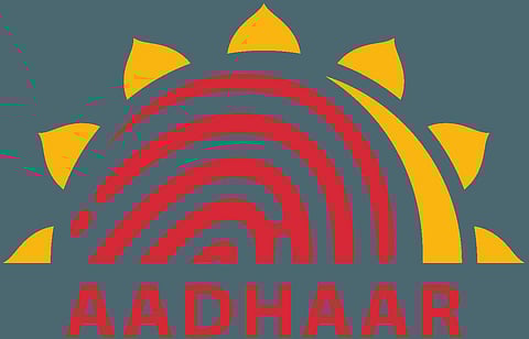 Not asked mobile makers, operators to include helpline number on phones: UIDAI