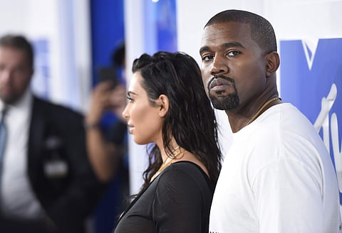 In this Aug. 28, 2016 file photo, Kim Kardashian West, left, and Kanye West arrive at the MTV Video Music Awards in New York. | Associated Press