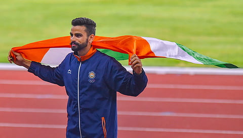 India's Arpinder Singh celebrates after winning the gold medal in men's triple jump competition (Photo | PTI)