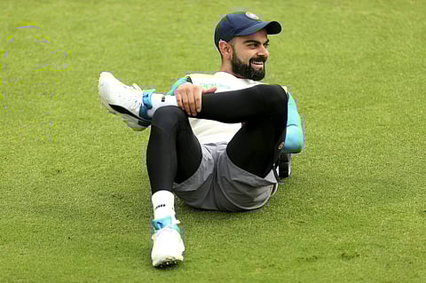 India's captain Virat Kohli, right, attends a nets session at The AGEAS Bowl, Southampton | AP