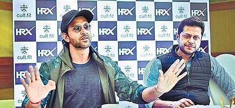Cult.fit founder Mukesh Bansal and brand ambassador Hrithik Roshan at a Press meet in Hyderabad on Saturday. (Photo | EPS/Vinay Madapu)