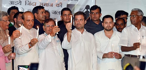 (L-R) CPI M leader Sitaram Yechury TMC leader Dinesh Trivedi Loktantrik Janata Dal leader Sharad Yadav Congress President Rahul Gandhi CPI leader D Raja and others during a protest over the issue of alleged sexual abuse at a government-funded shelter home