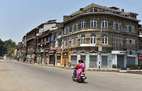 Security personnel patrol a street during a two-day strike called by the separatist leaders against the petitions in the Supreme court challenging the validity of Article 35A in Srinagar on August 5 2018. (Photo | PTI)
