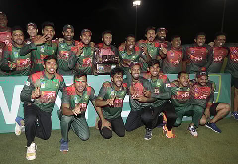Players of the Bangladesh team pose with the trophy after Bangladesh defeated the West Indies in a Twenty20 international cricket match, August 6, 2018, in Lauderhill, Florida. (Photo | AP)