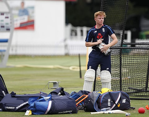 England's new cricket test match squad member Ollie Pope pads up during a training session at Lord's Cricket ground in London, Tuesday, Aug. 7, 2018. | AP