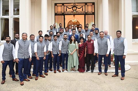 While many point out the oddity in seeing a players' spouse among the whole team, others slam that the Indian cricket team was at London meeting High Commissioner and not 'a family function'. | BCCI/Twitter