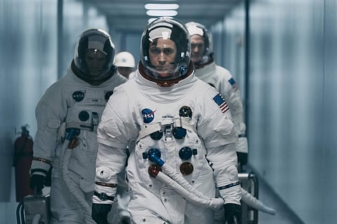 This image released by Universal Pictures shows Ryan Gosling in a scene from 'First Man.' (Daniel McFadden/Universal Pictures via AP)