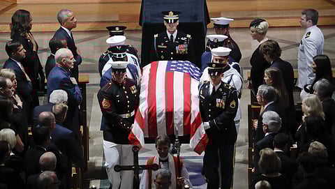 John McCain's casket is carried during the recessional at the end of the memorial service. (Photo | AP)