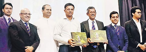 Former cricketer Rahul Dravid releasing a coffee table book at St Joseph’s Boys’ High School, on Friday| Pandarinath B