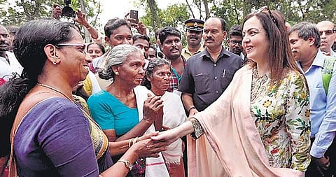 Reliance Foundation chairperson Nita Ambani interacts with flood-affected people at a relief camp at Pallipad in Alappuzha on Thursday | Express