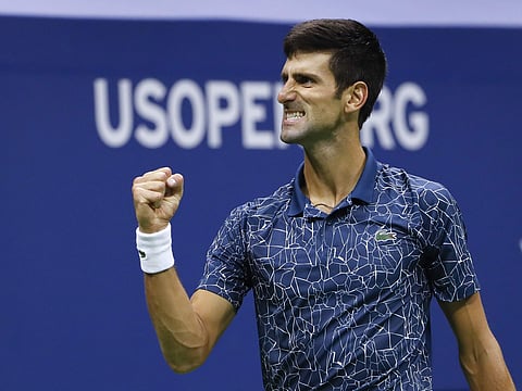 Novak Djokovic, of Serbia, reacts after breaking the serve of Juan Martin del Potro, of Argentina, during the men's final of the U.S. Open tennis tournament, Sept. 9, 2018, in New York. (Photo | AP)