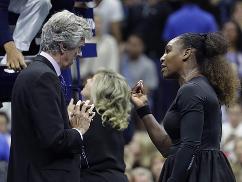 Serena Williams talks with referee Brian Earley during the women's final of the U.S. Open tennis tournament against Naomi Osaka, of Japan, Saturday, Sept. 8, 2018, in New York. | AP