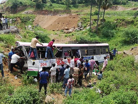 Crowd gathers at the accident site where the TSRTC bus fell in the gorge in Telangana. (Photo | By special arrangement)