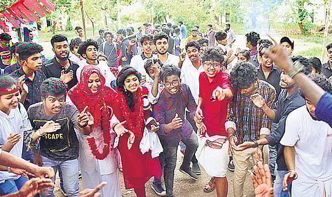 SFI activists celebrate after winning all the seats to the Maharaja’s College union council on Tuesday | Albin Mathew