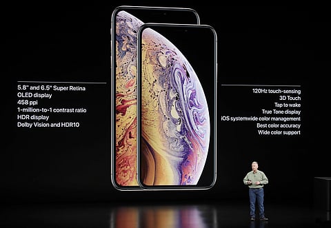 Phil Schiller, Apple's senior vice president of worldwide marketing, speaks about the Apple iPhone XS and Apple iPhone XS Max at the Steve Jobs Theater during an event to announce new Apple products. (Photo | AP)