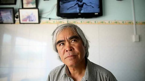 Associated Press photographer Huynh Cong 'Nick' Ut visits Kim Phuc's house near the place where he made his famous Pulitzer Prize-winning photograph of her as a terrified 9-year-old in Trang Bang, Vietnam. (Na Son Nguyen/Associated Press)