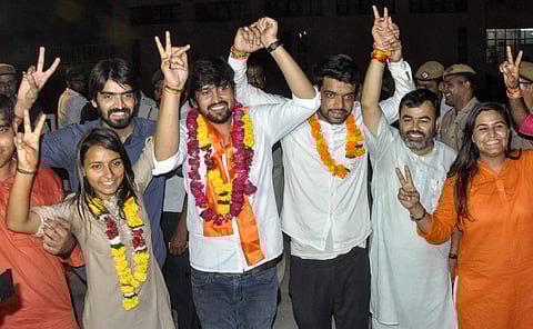 ABVP's panel's newly elected DUSU President Ankiv Basoya 3rd R Shakti Singh Vice President and Joint Secretary Jyoti Choudhary L celebrate after DUSU Election Result 2018 in New Delhi. (Photo | PTI)